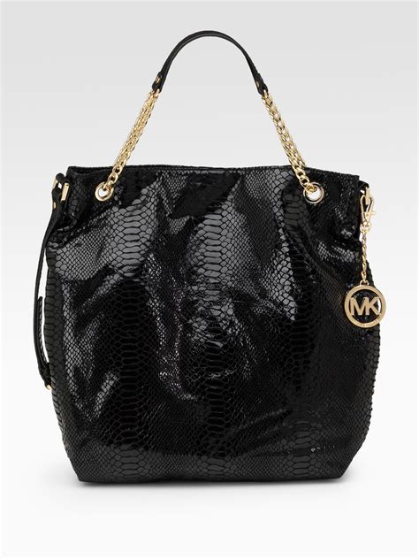 michael kors keating black white|Michael Kors black patent tote.